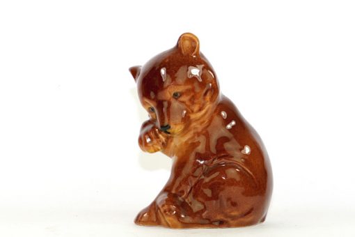Bilden visar Björnfigurin – Brun-björn av keramik chamotte eller porslin helhet