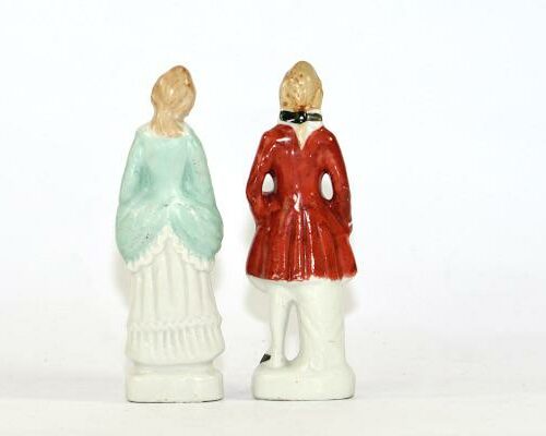 Bildern visar Figuriner rokoko-par - kvinna och man guld färg helhet ryggsida