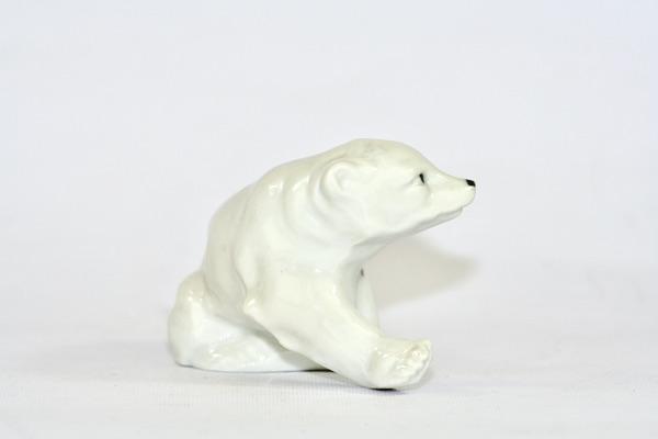 Bilden visar Isbjörn – Polar bear liten figurin sittande med ramar sida
