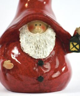 Bilden visar Tomte figurin med röd stor luva, skägg och lykta detalj